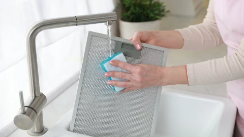 como limpiar los filtros de la campana